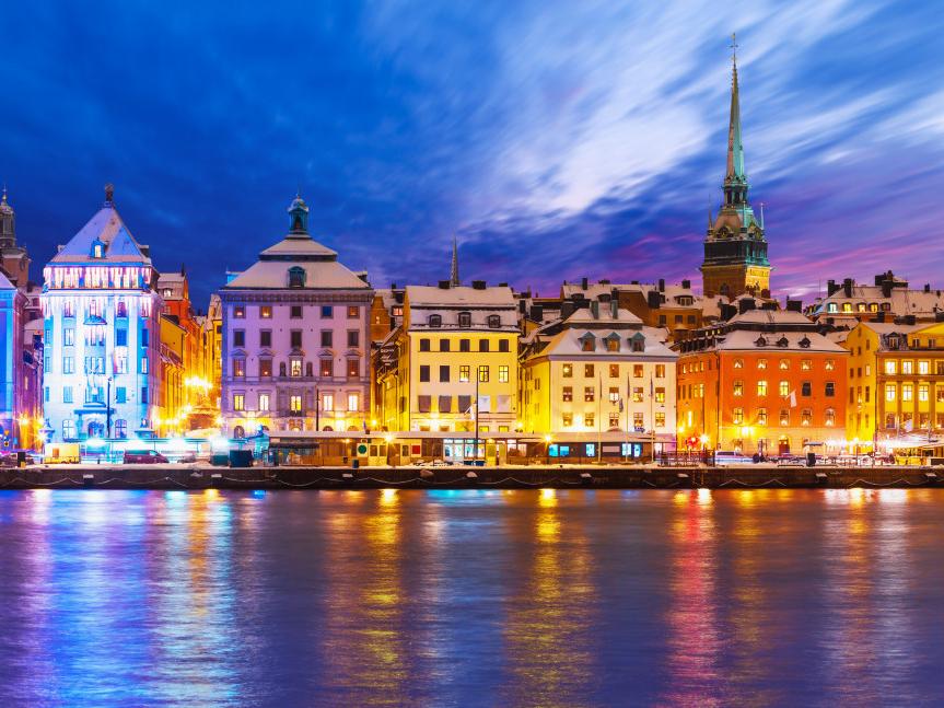 A colorful view of Stockholm, Sweden from the water.